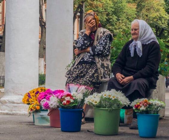 Ukrainian women selling flowers | GoNOMAD Travel