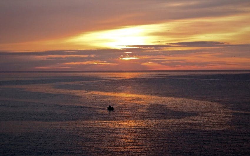 Sunrise over the Mediterranean catches a lone fisherman hard at work on Spain's Costa Brava. Eric Sweigert photos.