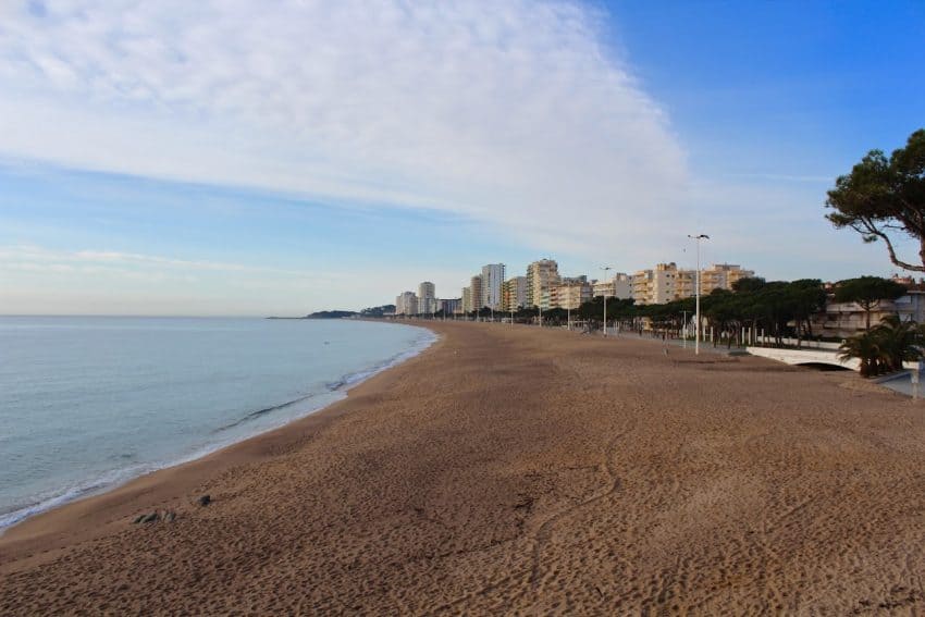 Waterfront at Platja d'Aro. During the high season, this beach will be swarming with sunbathers and beachgoers competing for their spot.