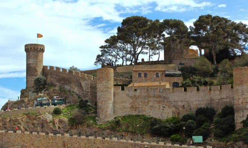 The walled old-town of Tossa de Mar once barred its gates to marauding pirates but now welcomes (mostly) the tourists that flock here in the high season.