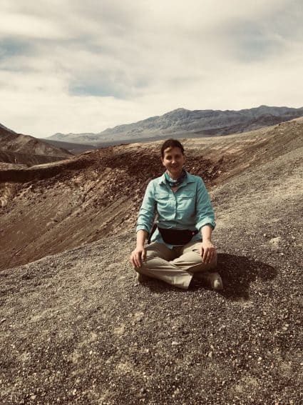 Taking a break during a long hike in Death Valley. | GoNOMAD Travel