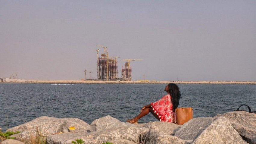 I climbed a bunch of rocks to capture a glimpse of fast developing city Eko Atlantic, took me 5 mins to go up and 10 to come down