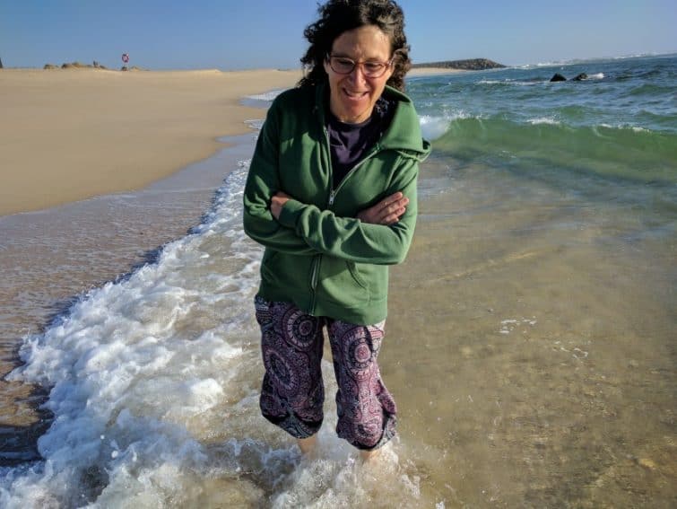 Dina, the author's wife, on the beach in Costa Nova, Portugal. 