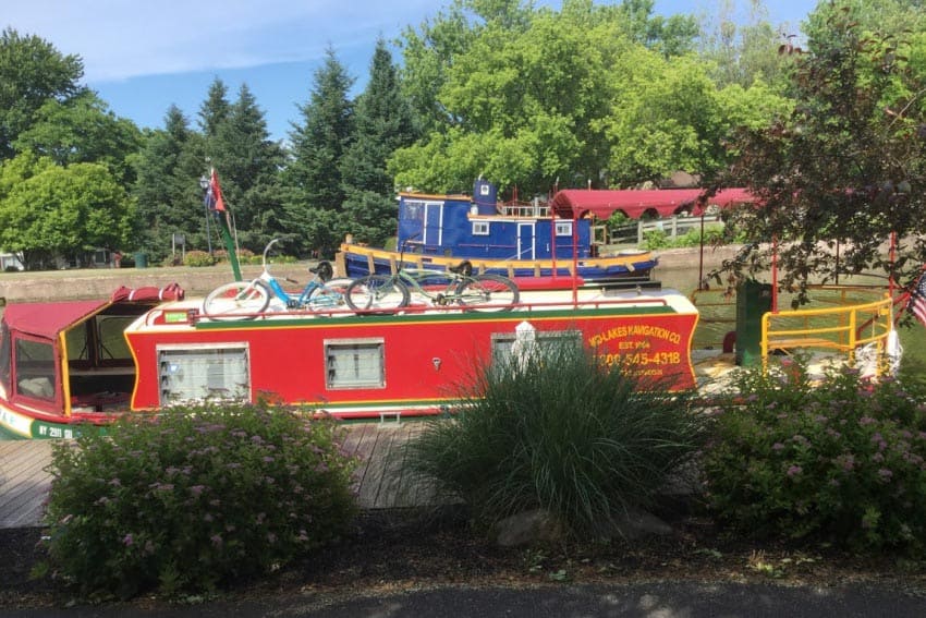 A side view of our rental barge. The blue tug in the background is assigned to the Erie. Sharon A. Roth photos.