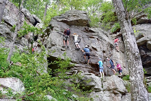 Climbers climbing the different routes at HCR. Photo by Horseshoe Canyon Ranch Adventures.