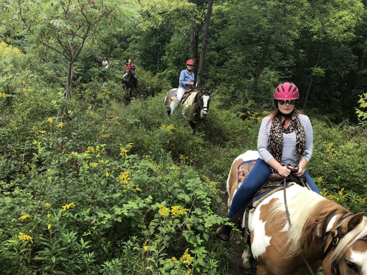 Trail riding outside of Watkins Glen, NY at Painted Bar Stables.