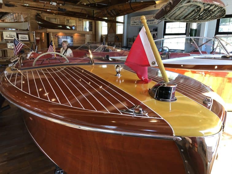 Antique Chris-Craft wooden motor boats on display at the Lawson Center in Bemus Point, New York. 