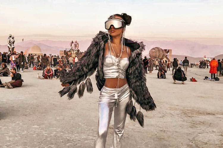 A Russian woman strolls the Playa at Burning Man 2018 in Nevada.
