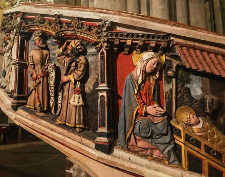 Religious figures depicted on the spiral stone staircase by artist Antoni Sancho in the Church of Santa Maria la Mayor. Photo by Olivia Gilmore.