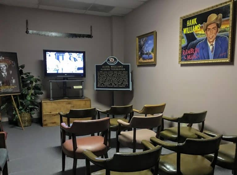 A small room lets visitors watch video performances by the legend.