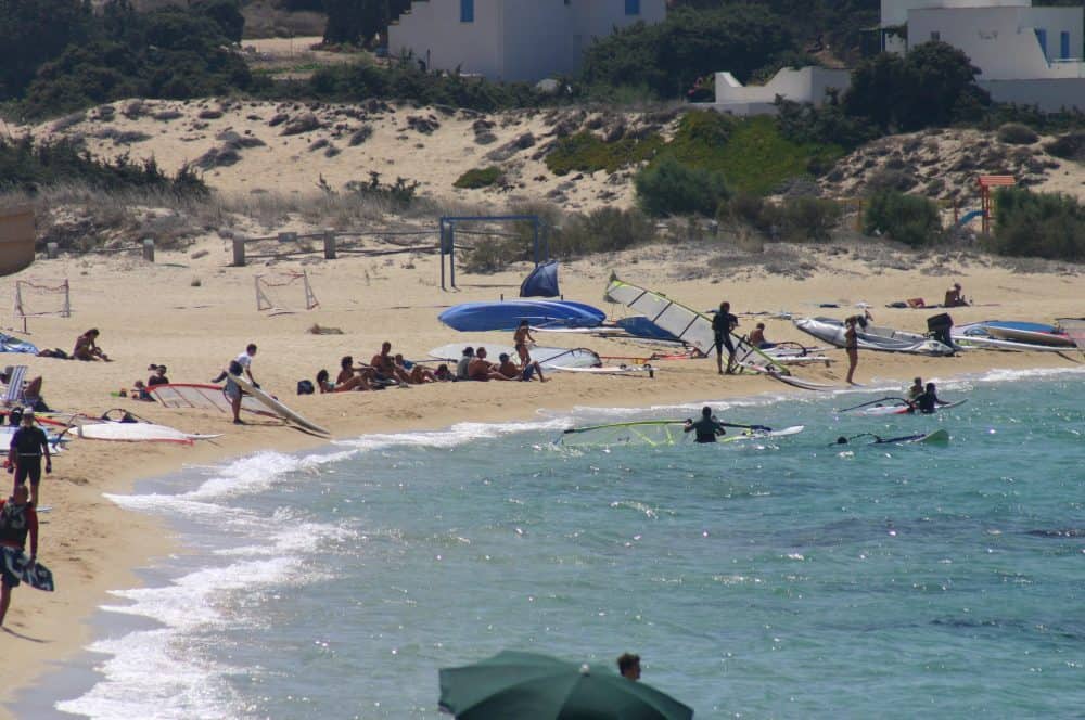 Windsurfers on the beach at Brunobarato, Naxos, Greece.