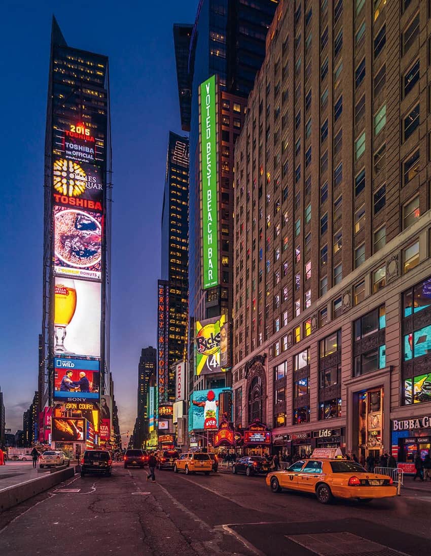  Scene from a stroll through Manhattan—larger-than-life video screens and billboards from a pedestrian’s perspective.