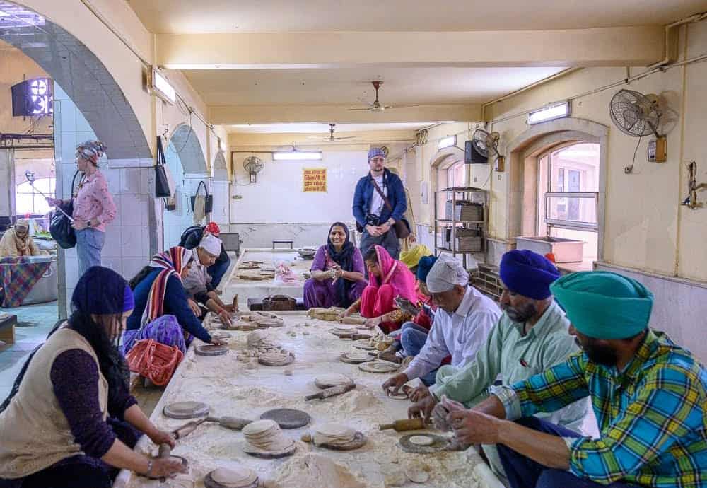 Volunteers are welcome to help out in the Langar (community kitchen), including the task of the rolling out chapati dough.