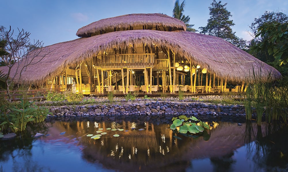 Sakti Dining Room at Fivelements Healing Center, a vegetarian hotel. The soaring roofline, sculpted from bamboo and thatch, resembles a banana leaf, symbol of nourishment. Banjar Baturning, Bali Photo © Djuna Ivereigh