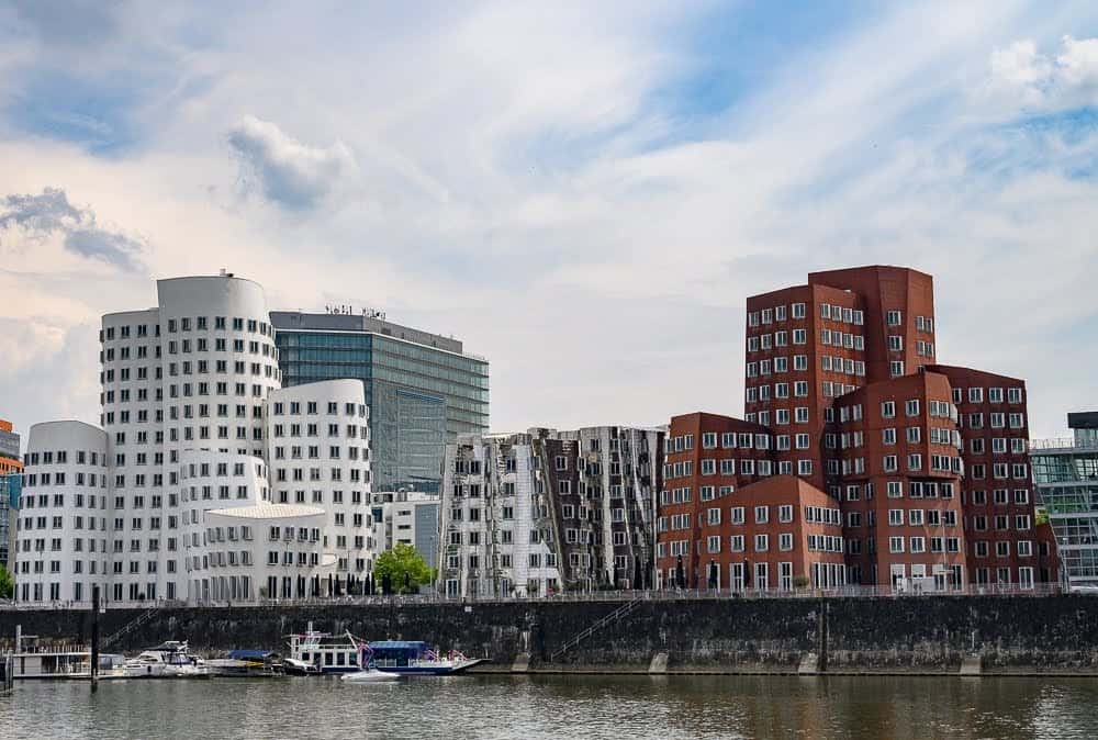 The Neuer Zollhof buildings are the creation of architect Frank Gehry and can be found in the Media Harbor area of Dusseldorf.