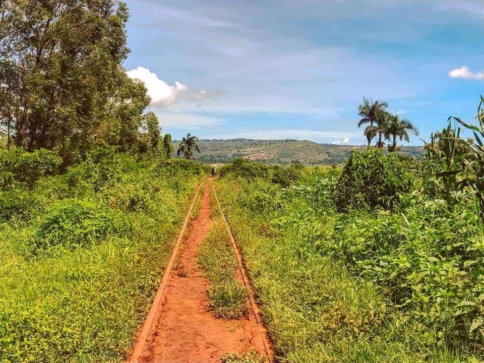 Abandoned railroad line and natural landscape in Jinja Village, Uganda.