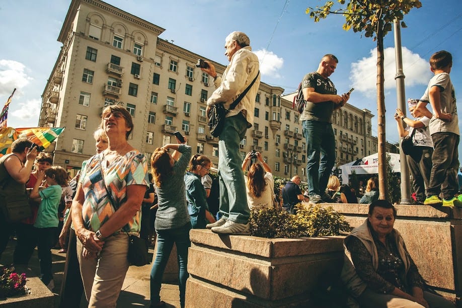 Onlookers watch a tightrope walker in Moscow.