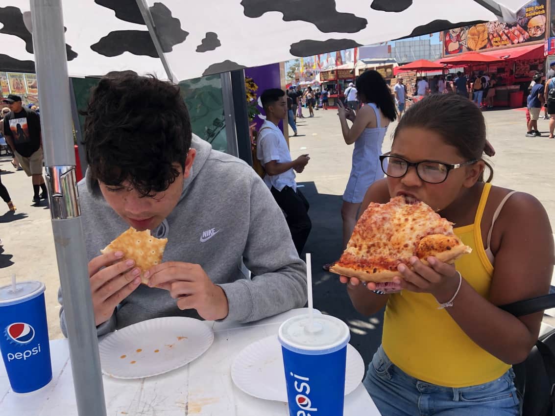 Big pizza slices hit the spot at the Orange County Fair in Costa Mesa, CA. 