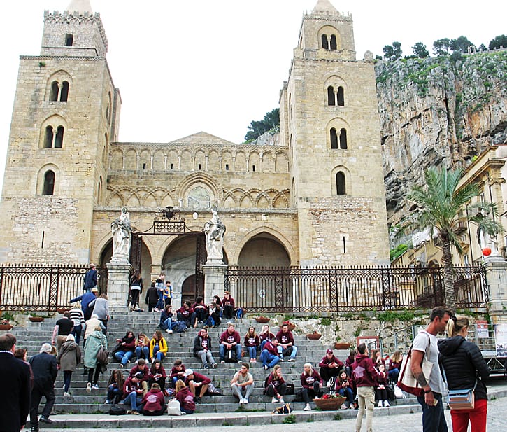 A school group rests after their tour of the cathedral in Cefalù, Sicily. (Photo by Susan McKee)