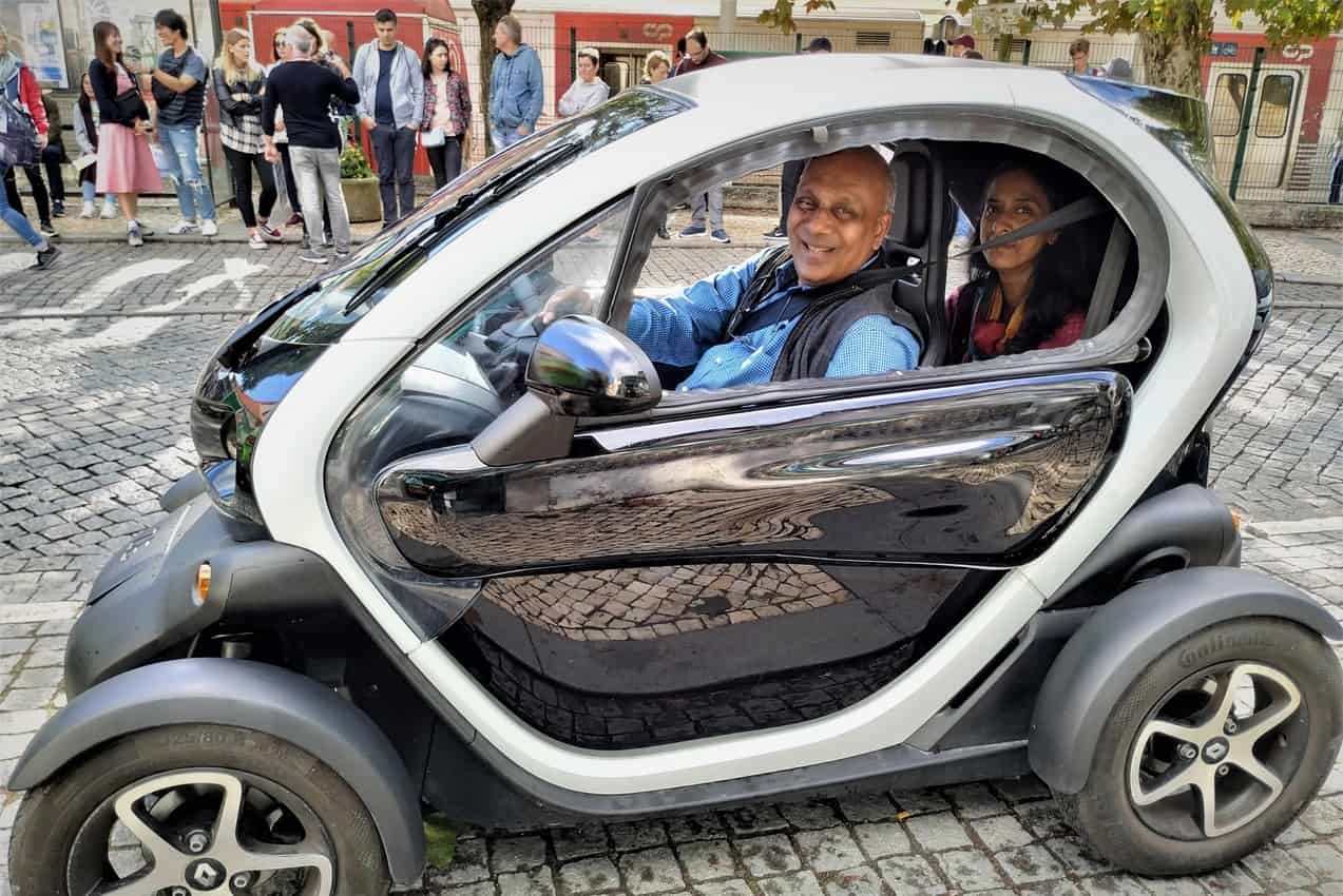 Exploring Sintra with my wife, Nirmala, in an electric vehicle