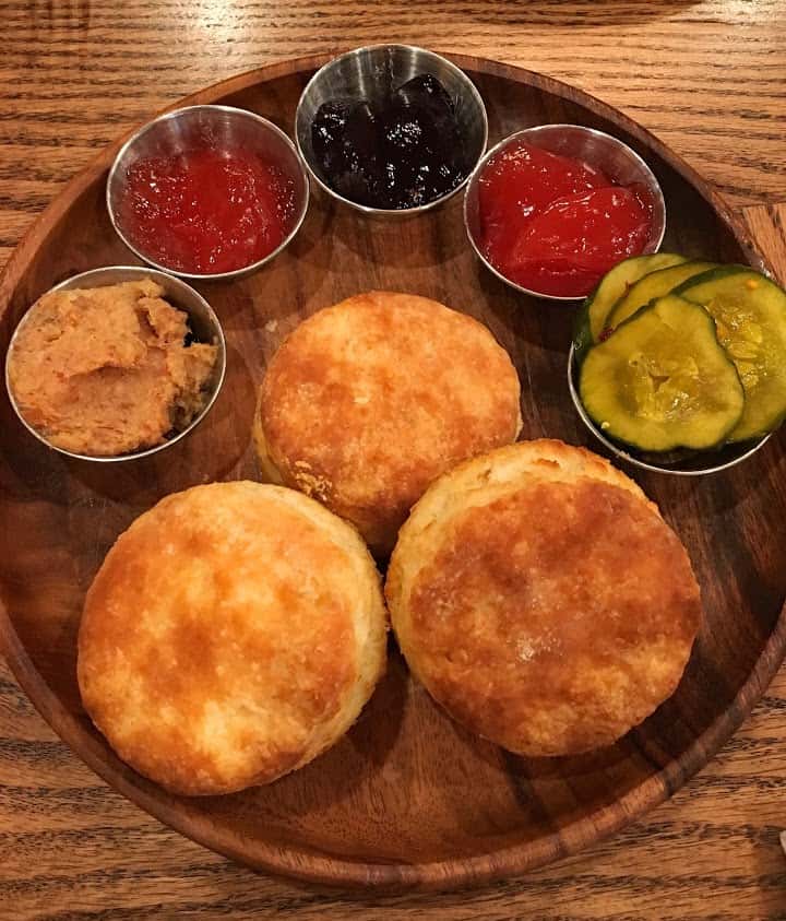 Homemade biscuits with jam or gravy flights are the specialty of the house at Boomtown Biscuits & Whiskey in Cincinnati’s Pendleton neighborhood. 