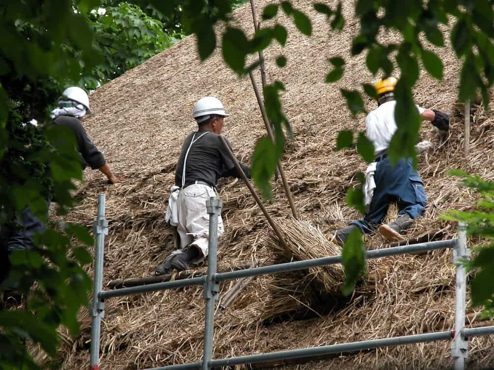 Replacing a thatch roof, like here at Ishiguro Samurai House in 2007, requires importing skilled roofers specializing in the craft