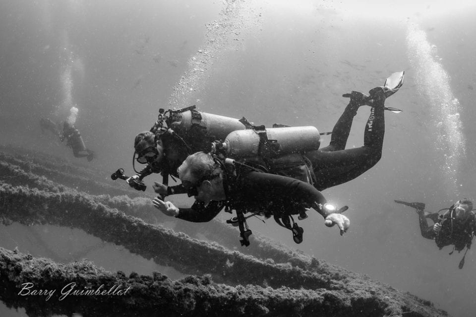 Ed and Jennifer diving in Panama City Beach, Florida. Photo by Barry Guimbellot.
