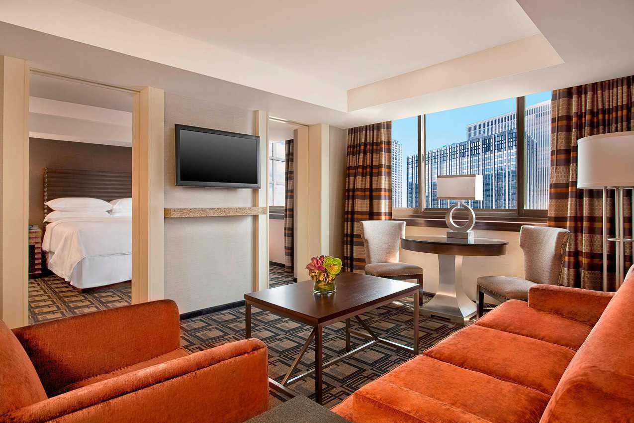 The New York Sheraton's Club Suites are about the size of a New York City apartment. Definitely room enough for two couples to share and have plenty of room to party!