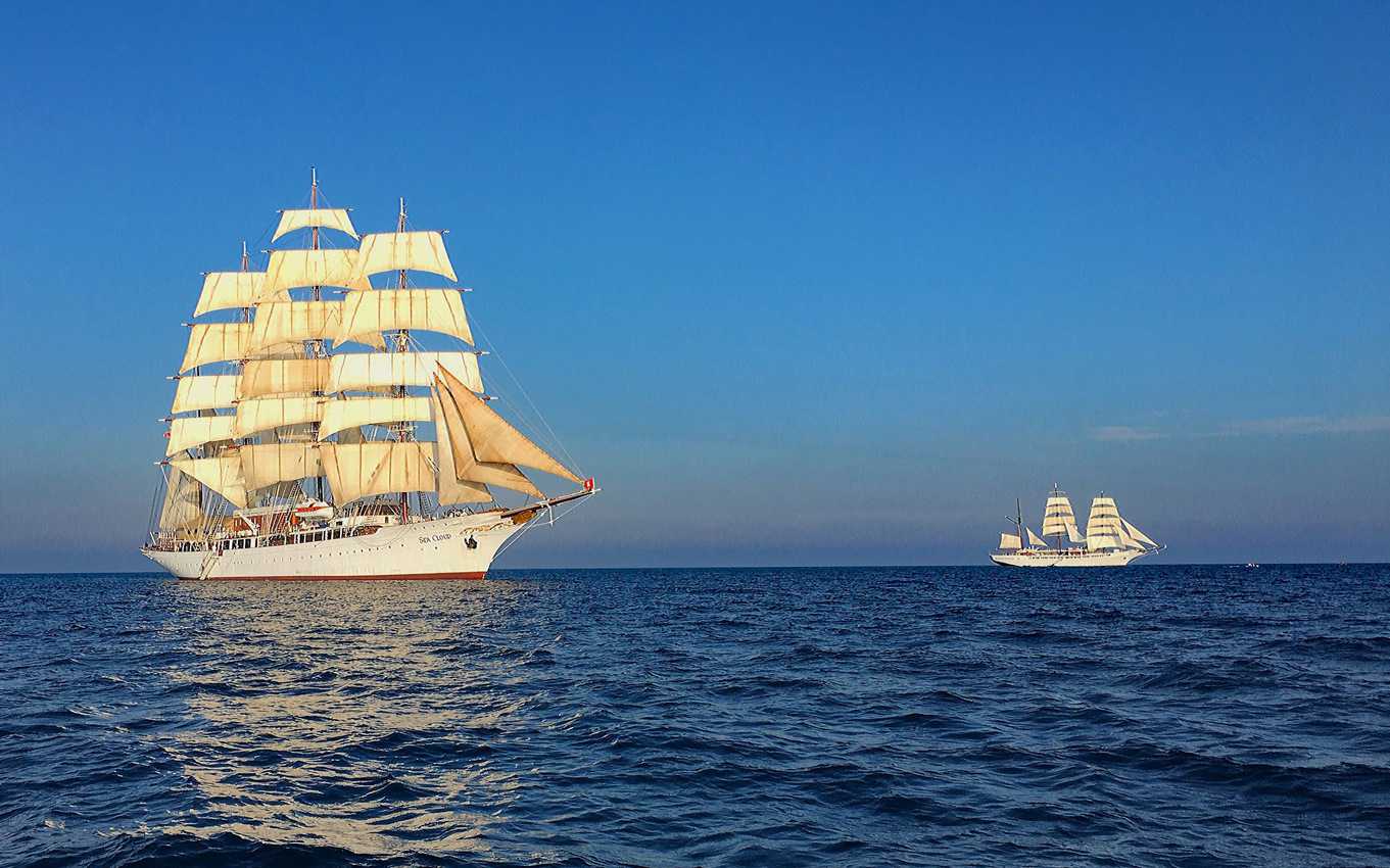 Sea Cloud, left, often sails with sister ship, Sea Cloud II, on fall cruises along the coast of Spain. 