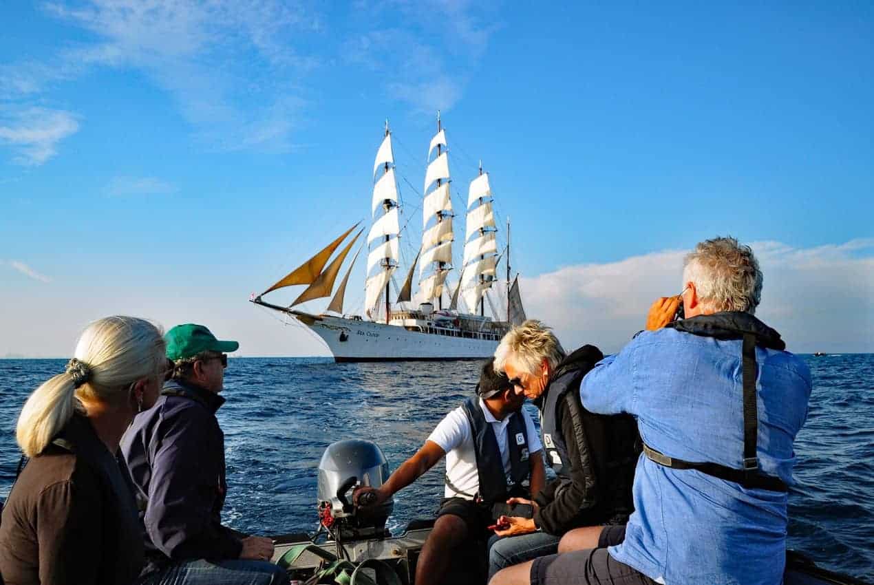 Zodiacs take passengers on a photo safari to shoot Sea Cloud with her sails up. 