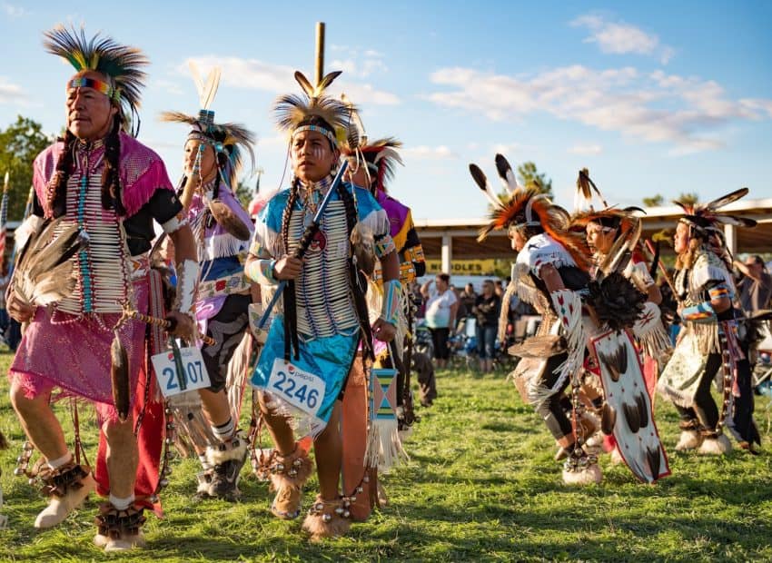 Dance competitions during the powwows are divided by both age groups and by the style of dress contestants wear. These contestants are competing in the 'traditional' category.