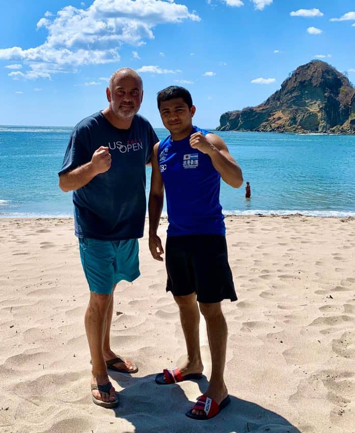 Paul Cohen, left, on the beach with a recent guest, Román González, Nicaragua’s World Champion Boxer at Aqua Oceanfront Resort in Nicaragua.