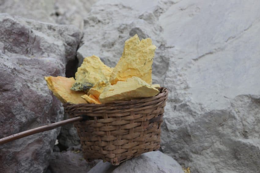 A basket of sulfur at the Ijen Crater.