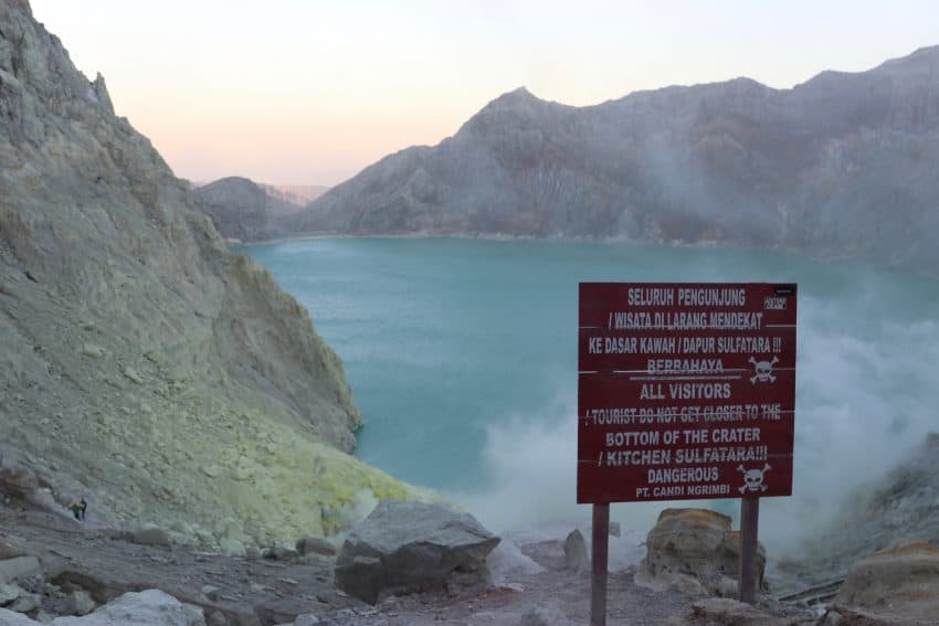 Sign warning about the dangers in the Ijen Crater