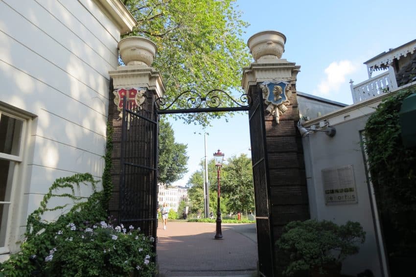 The entry gates to the Hortus Botanicus bear the coats of arms of early patrons Photo Credit: Sharon Kurtz . 