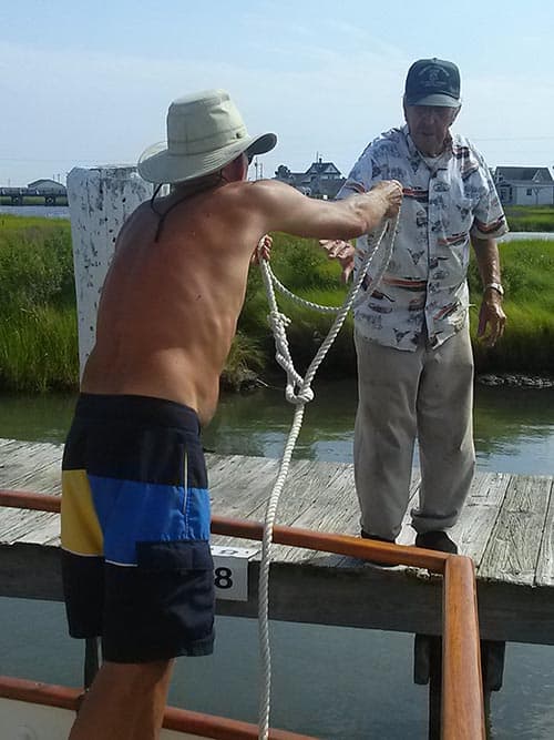 men at wharf