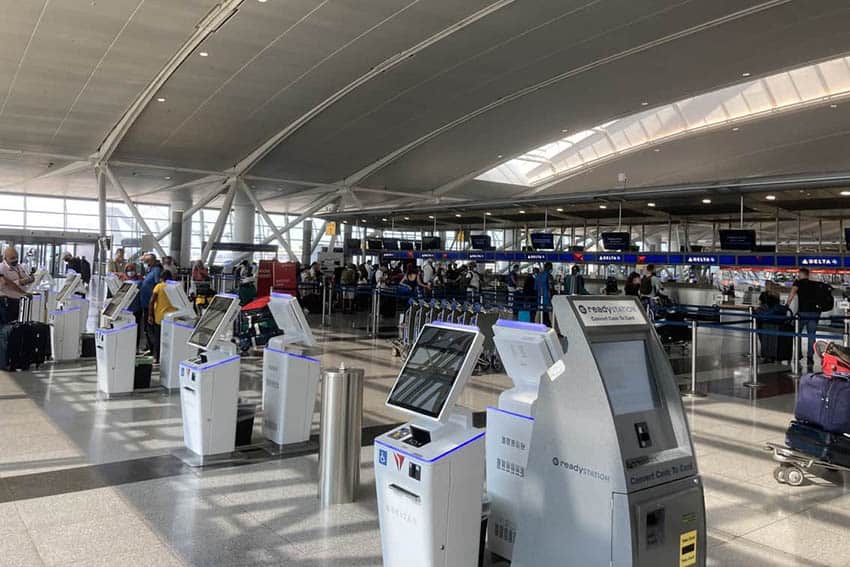 Delta check in at JFK Airport. Take the Airtrain to the airport from Manhattan.