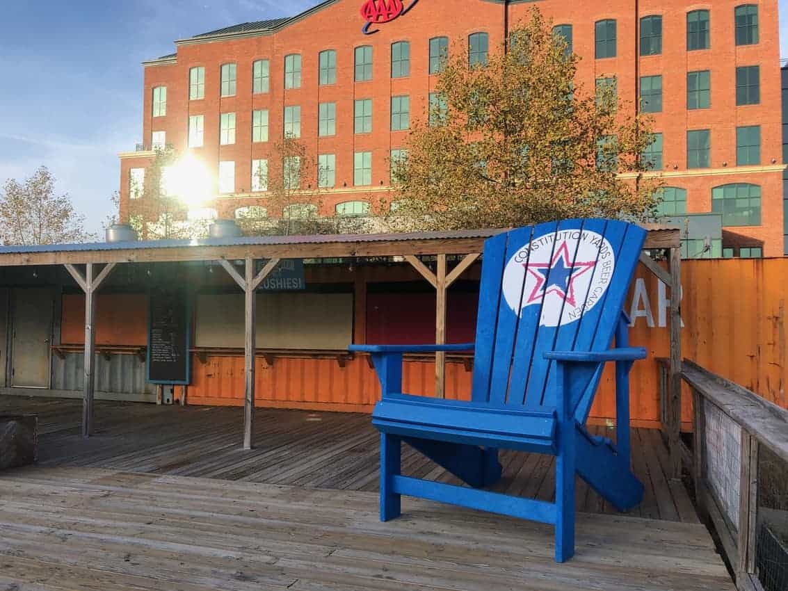 Constitution Yards with a 12-foot high chair, ax throwing and beer gardens in Wilmington Delaware.