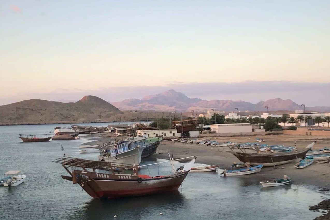 fishing and traditional dhow boats situated in the coastal town of Sur, Oman.
