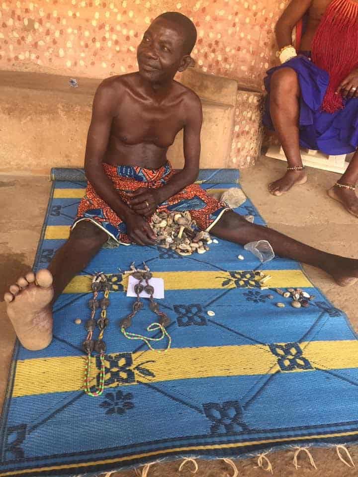 A priest in Klikor, a small town in the Volta region, gave my friend a reading of her future with chosen amulets splayed out in front of him. 