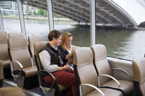 Enjoying their boat ride! Uber Boat by Thames Clipper Photos.