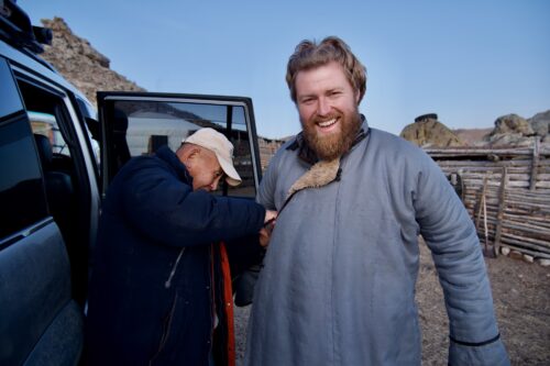 Donning our sheepskin coats as the temperature dropped to as low as -20. Our host and guide found this extremely amusing.