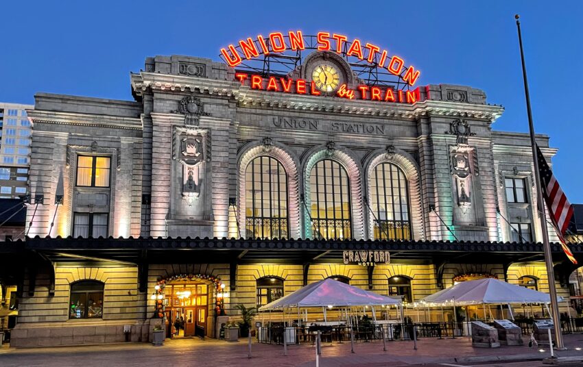 Union Station in Denver with its motto: Travel by Train.