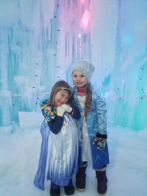 Children dressed like Elsa from the movie Frozen sang lyrics from "Let It Go" as they pretended Ice Castles was the kingdom of isolation. 