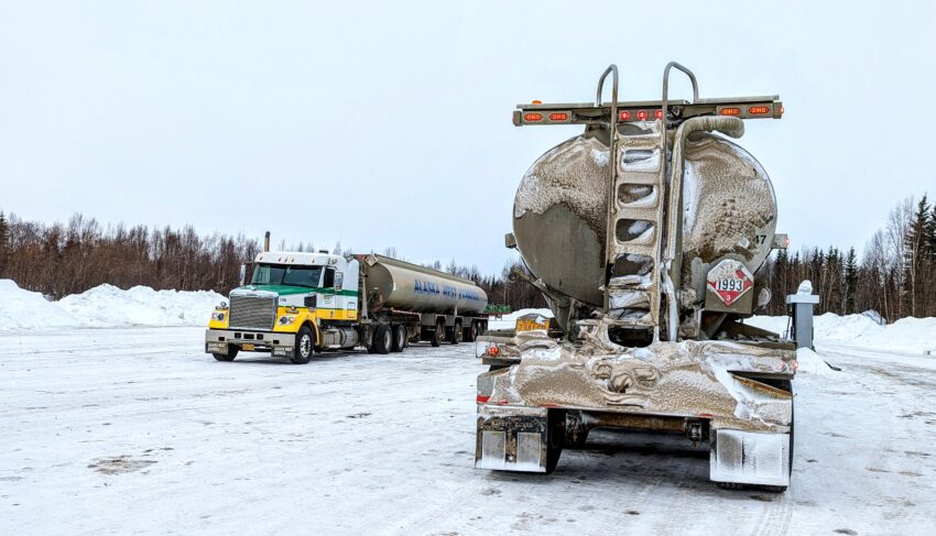 Ice covered trucks getting gas at Coldfoot Camp Truck Stop