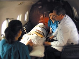 On board an evacuation plane with Medjet.