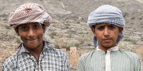 Two boys on the roadside, Jebel Shams, Oman