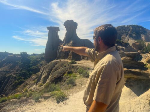 The badlands that make up the topography at Makoshika State Park offer thousands of interesting rock formations, says park manager Riley Bell, pointing to Twin Sisters, one of the park's many features.