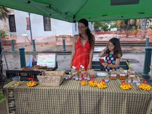 Puerto Rican farmer Naya and her daughter sell their fresh produce, hot sauces, and soaps at the Old San Juan farmer's market that takes place every Saturday morning