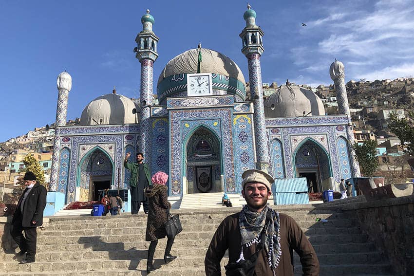BLENDING IN- Wearing my local Afghan clothing while visiting the Sakhti Shrine in Kabul.